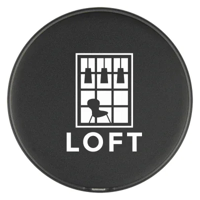 Round wireless charging pad with an LED lit surface