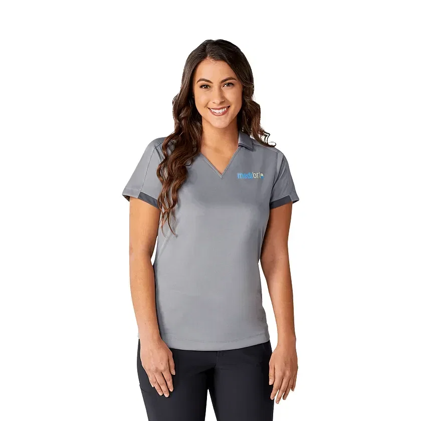Custom Women's Cerrado Short Sleeve Performance Polo being worn
