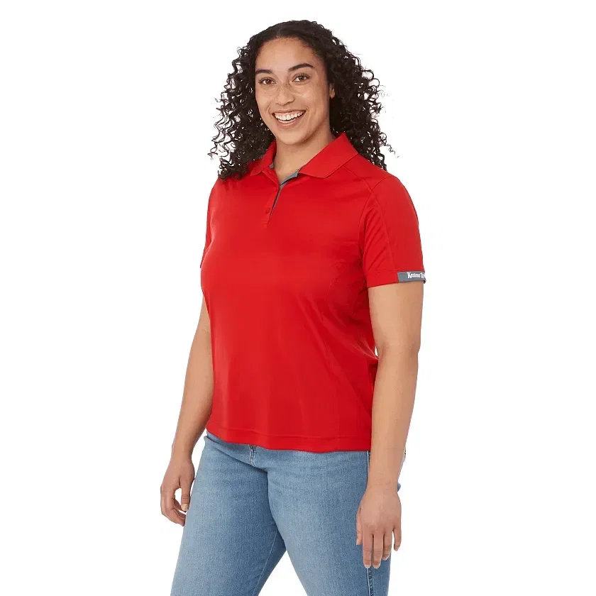 Women's KISO Performance Polo with Moisture-Wicking Finish being worn