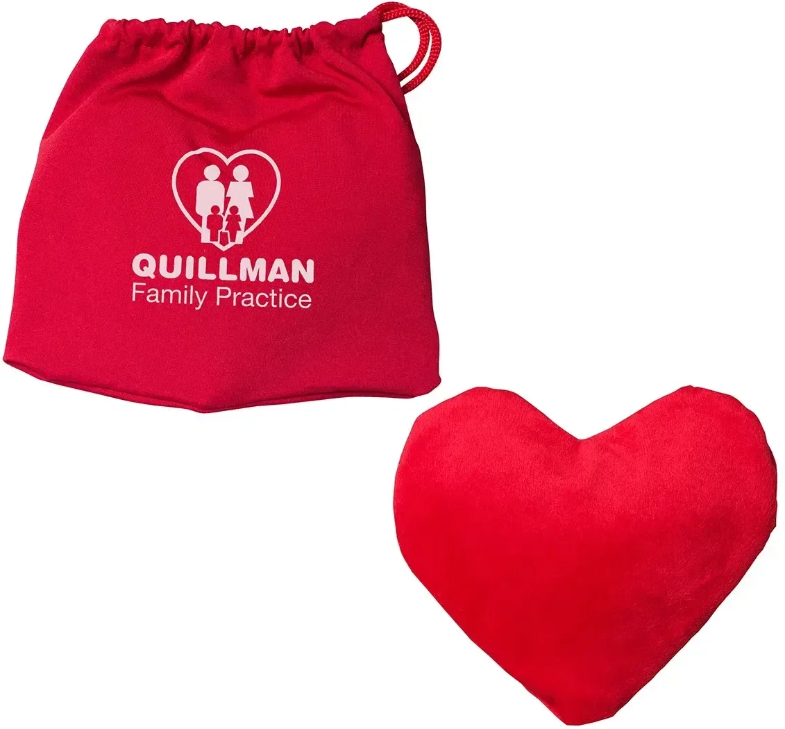 Side view of the branded lavender heart heat pack, a promotional wellness gift